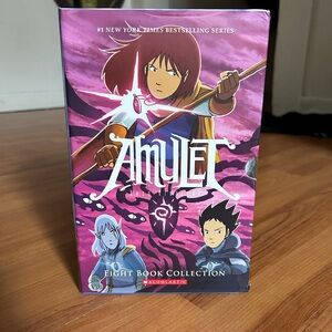 Scholastic Amulet Series Box Set with Blue and Yellow Cover